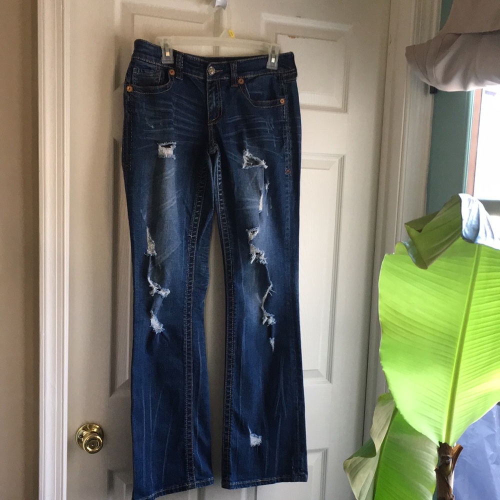 Women's Distressed Blue Jeans